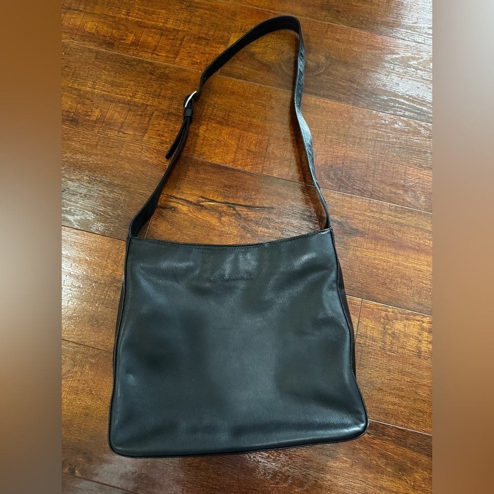 Black Leather Messenger Bag with Adjustable Strap and Matte Finish
